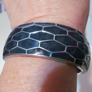Blue and silver tone clapper bracelet
